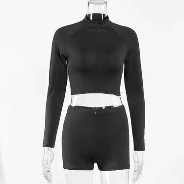 Amp Up Your Workout in the Bold Black Crop Set - Estalios